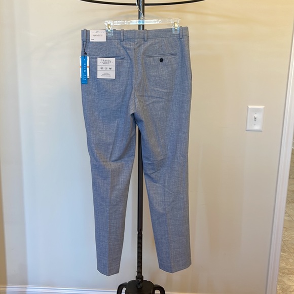 Brand new Mens Perry Ellis light blue dress pants. Size 33x32. - Picture 2 of 3
